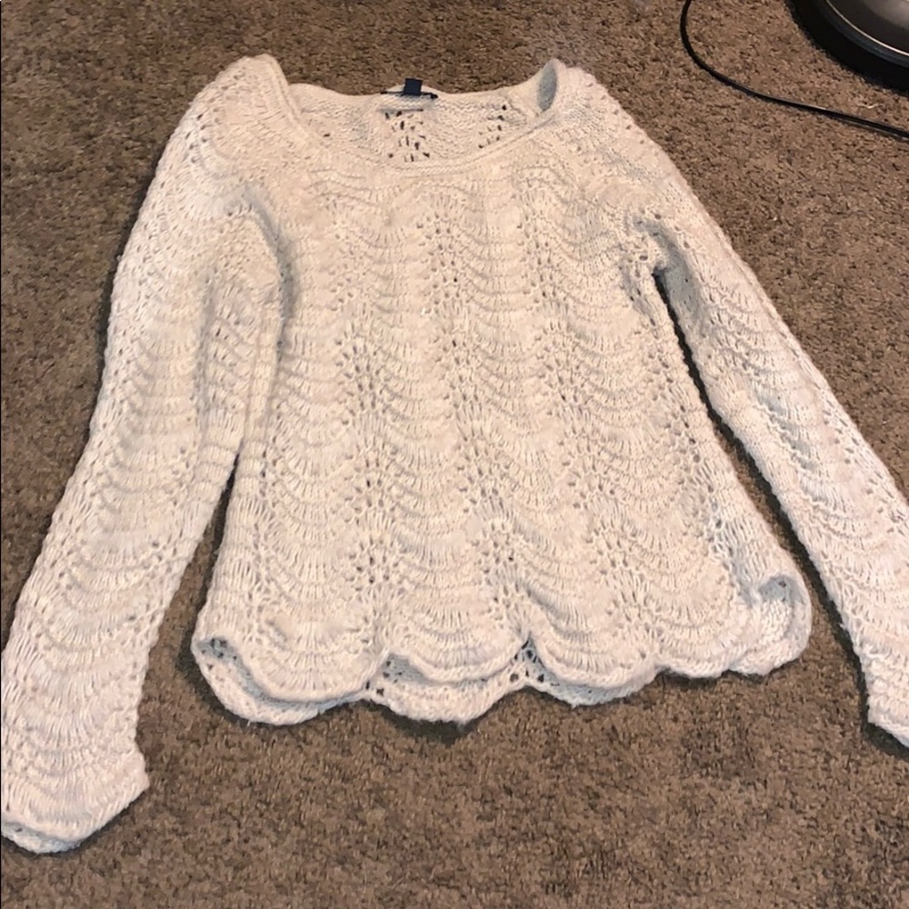 Cream colored cable knit sweater